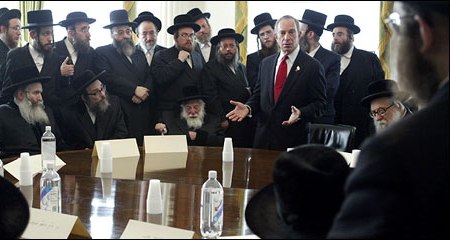 NYC Mayor Bloomberg in conference room full of Chasidic Jews